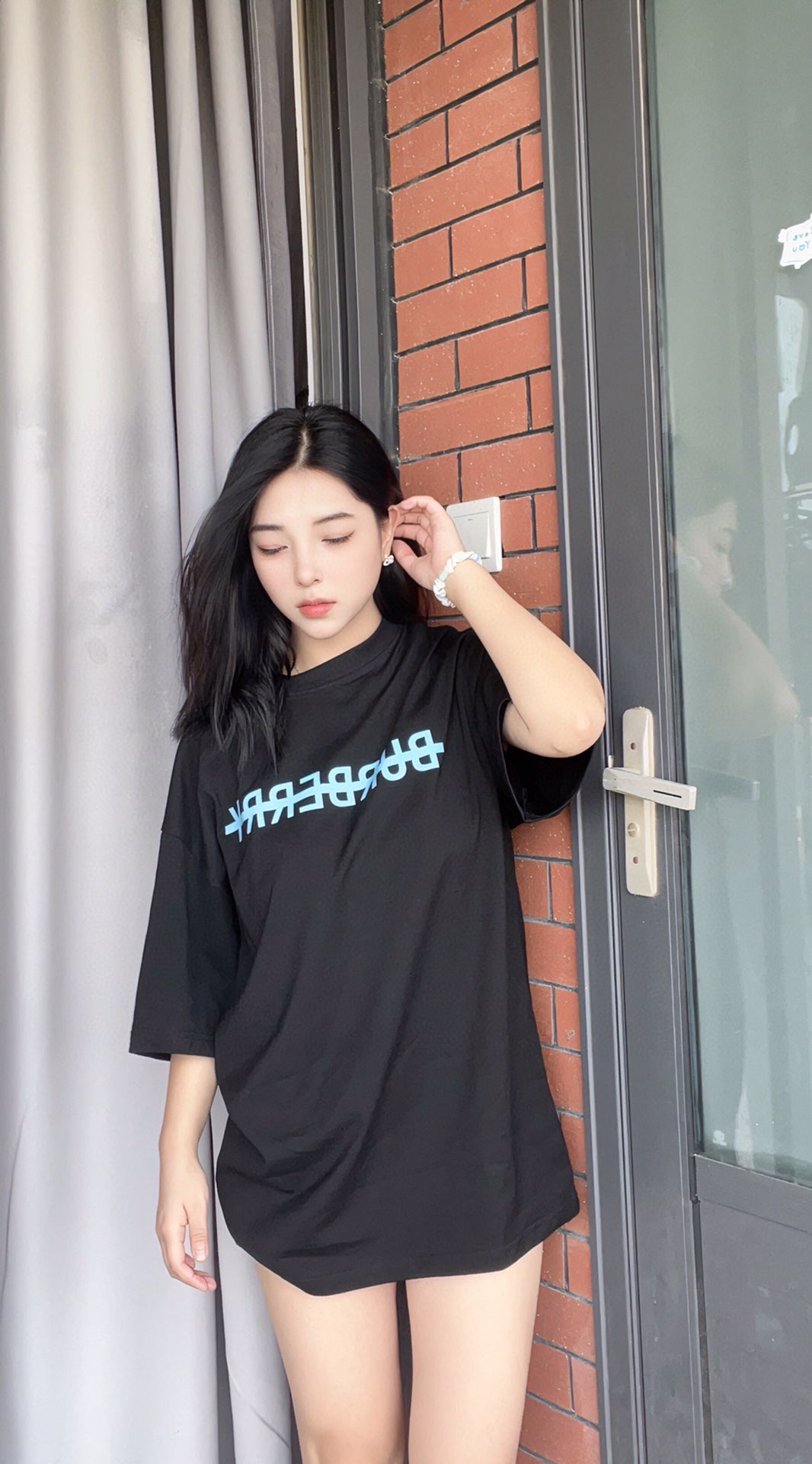 B**rry t-shirt with strikethrough logo