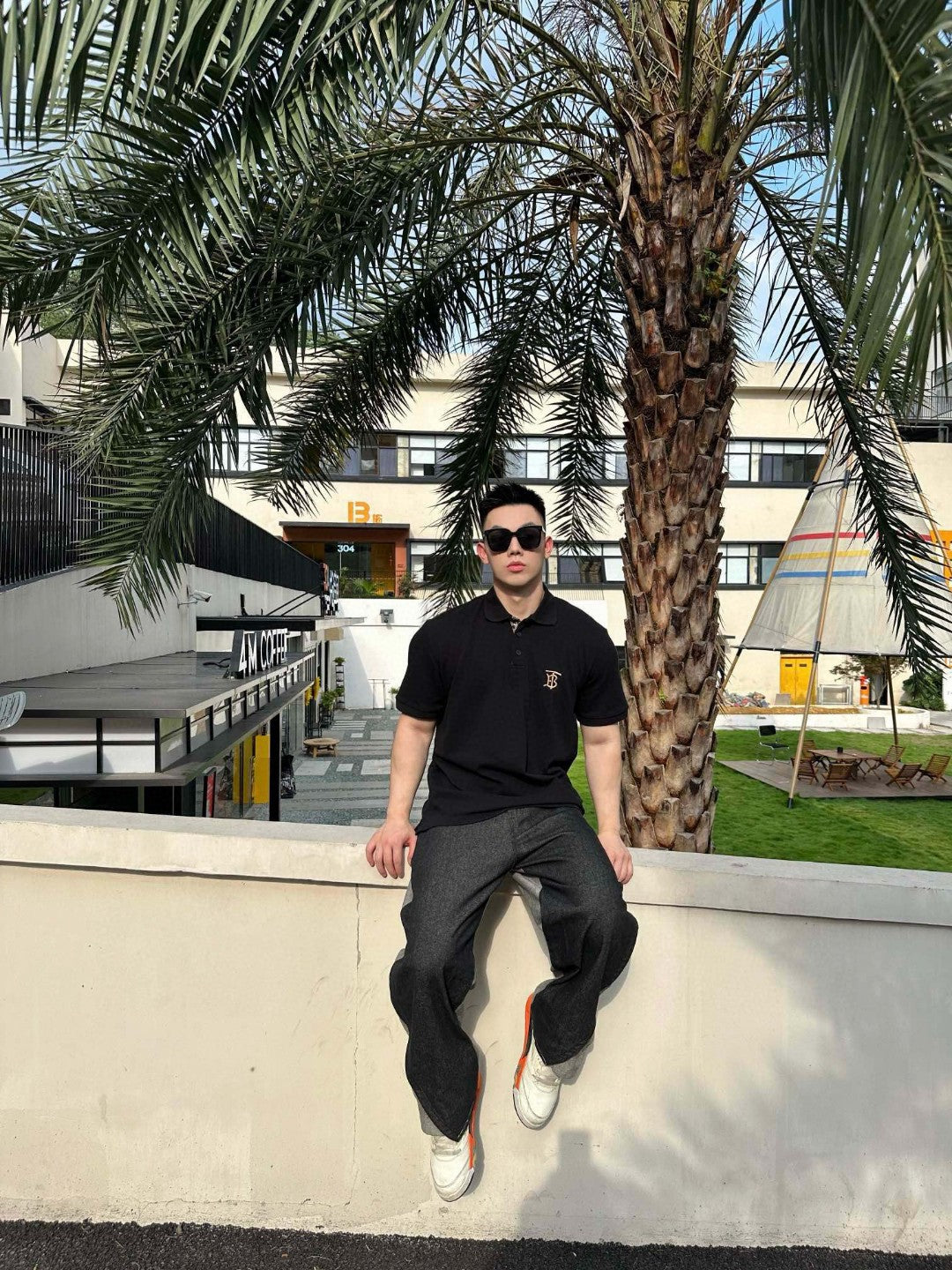 B**rry monogram logo black polo shirt