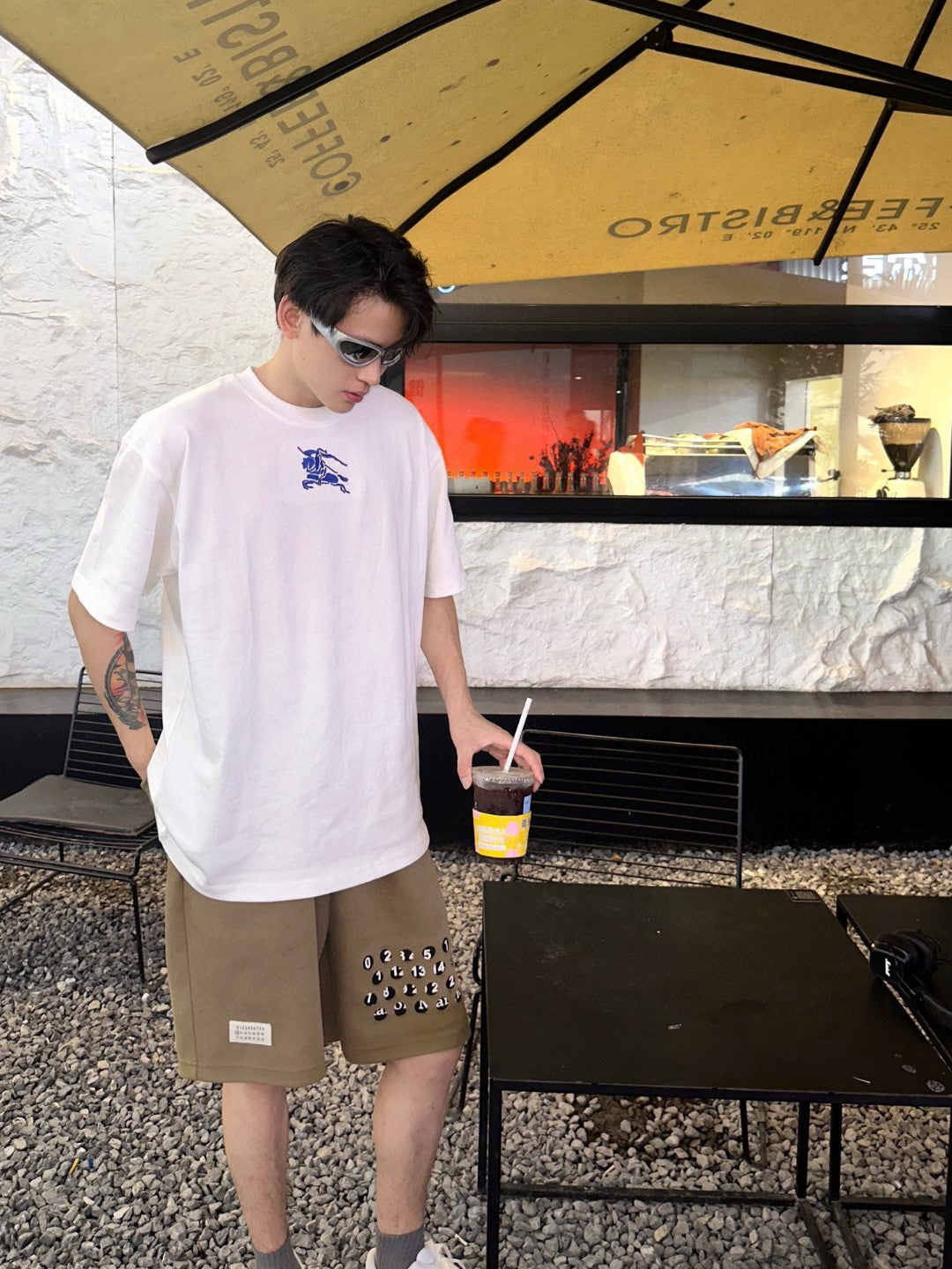 B**rry white t-shirt with blue equestrian knight logo