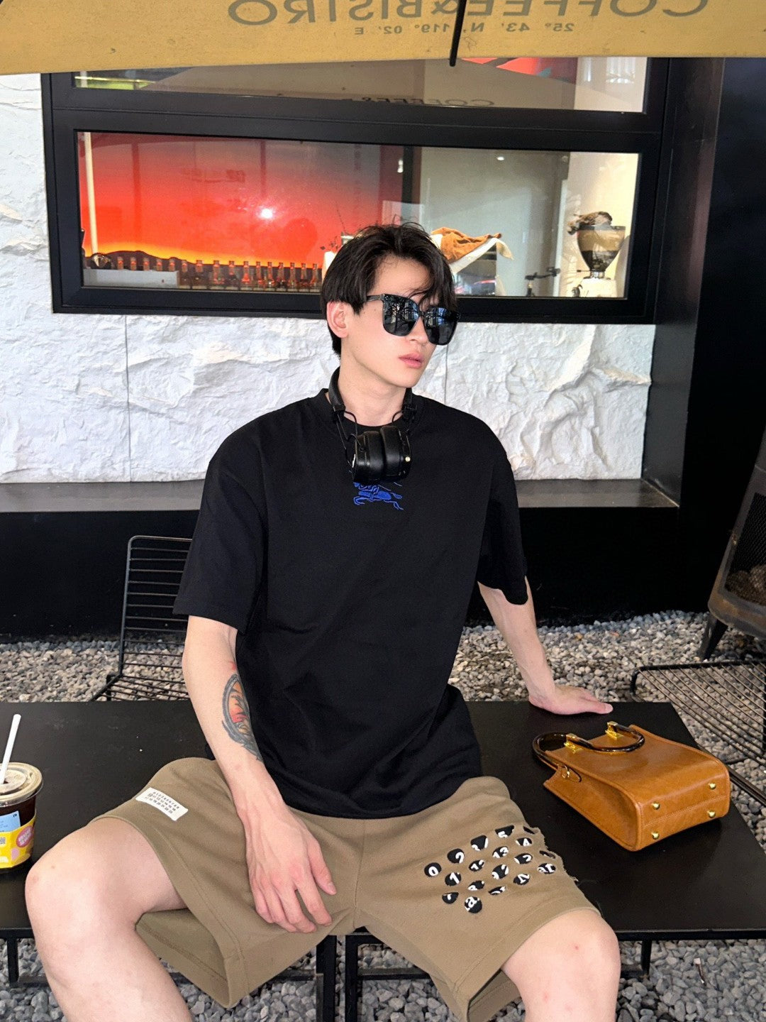 B**rry black t-shirt with blue equestrian knight logo