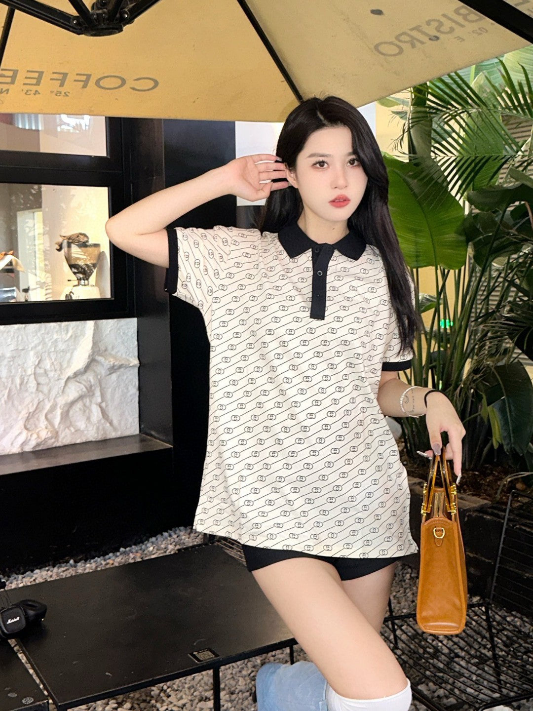 G*u*i beige and black patterned polo shirt