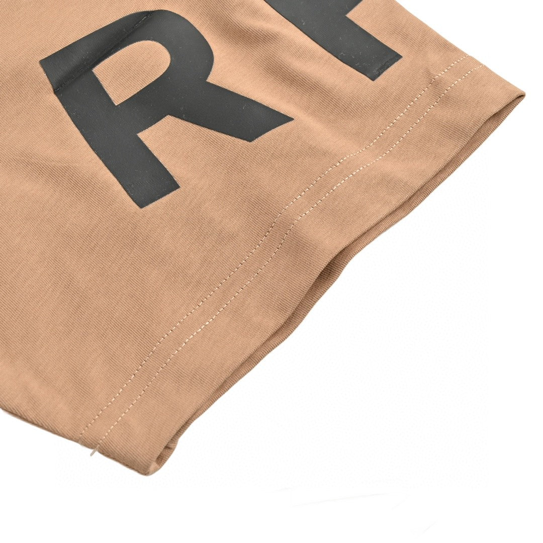 B**rry beige t-shirt with graphic text