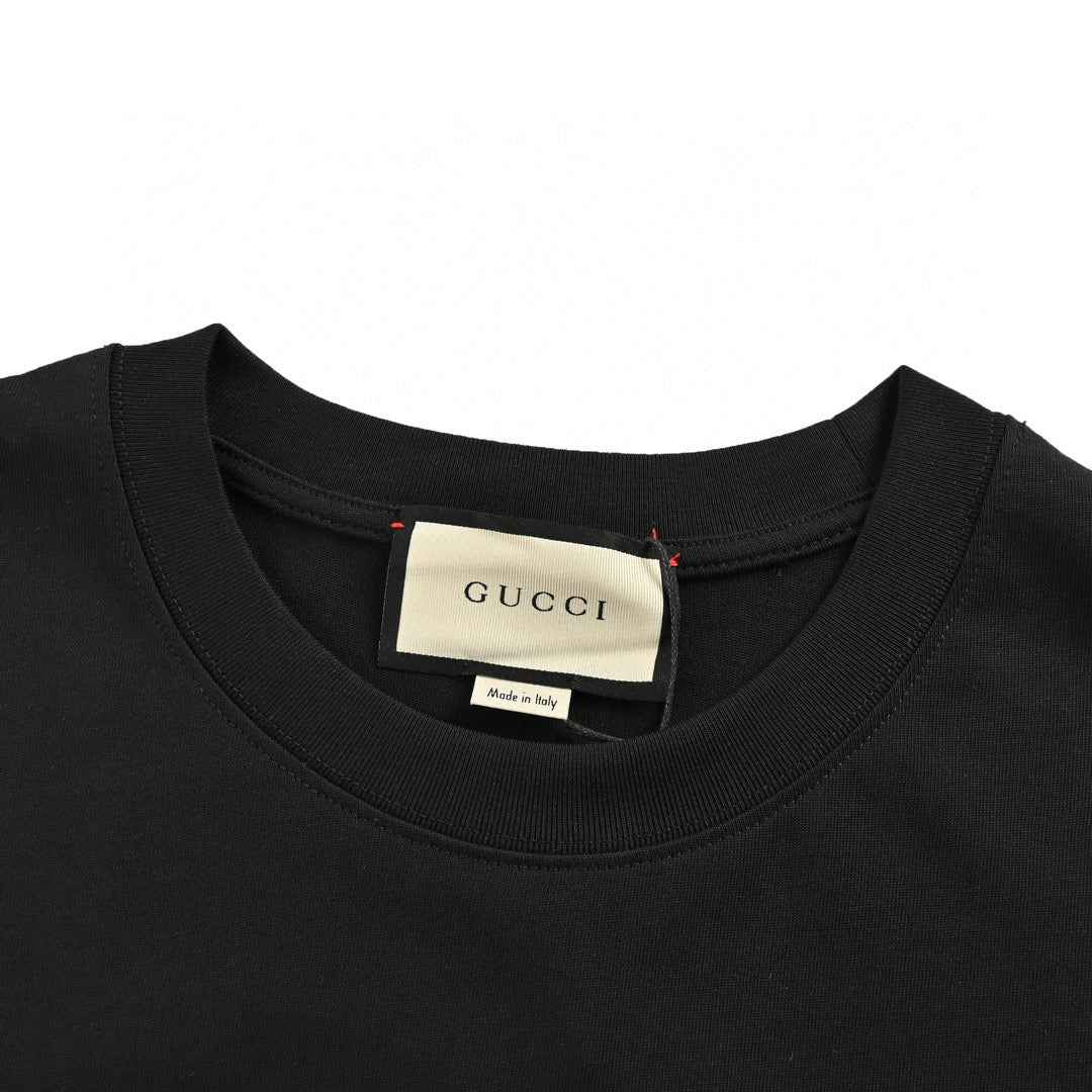 G*u*i snowboarder graphic black t-shirt