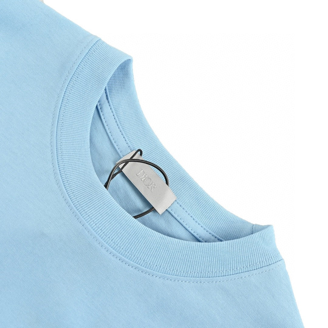 D*or ch**an D*or couture light blue t-shirt