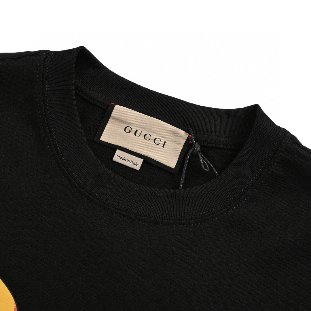 G*u*i black t-shirt with dragon cartoon
