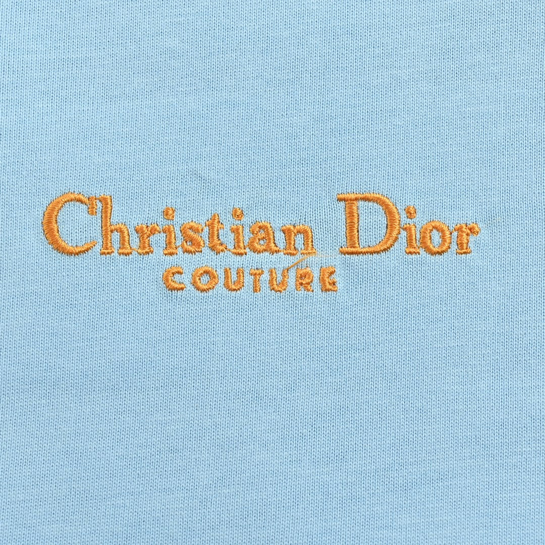 D*or ch**an D*or couture light blue t-shirt