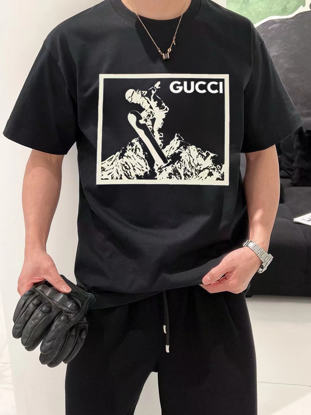 G*u*i snowboarder graphic black t-shirt