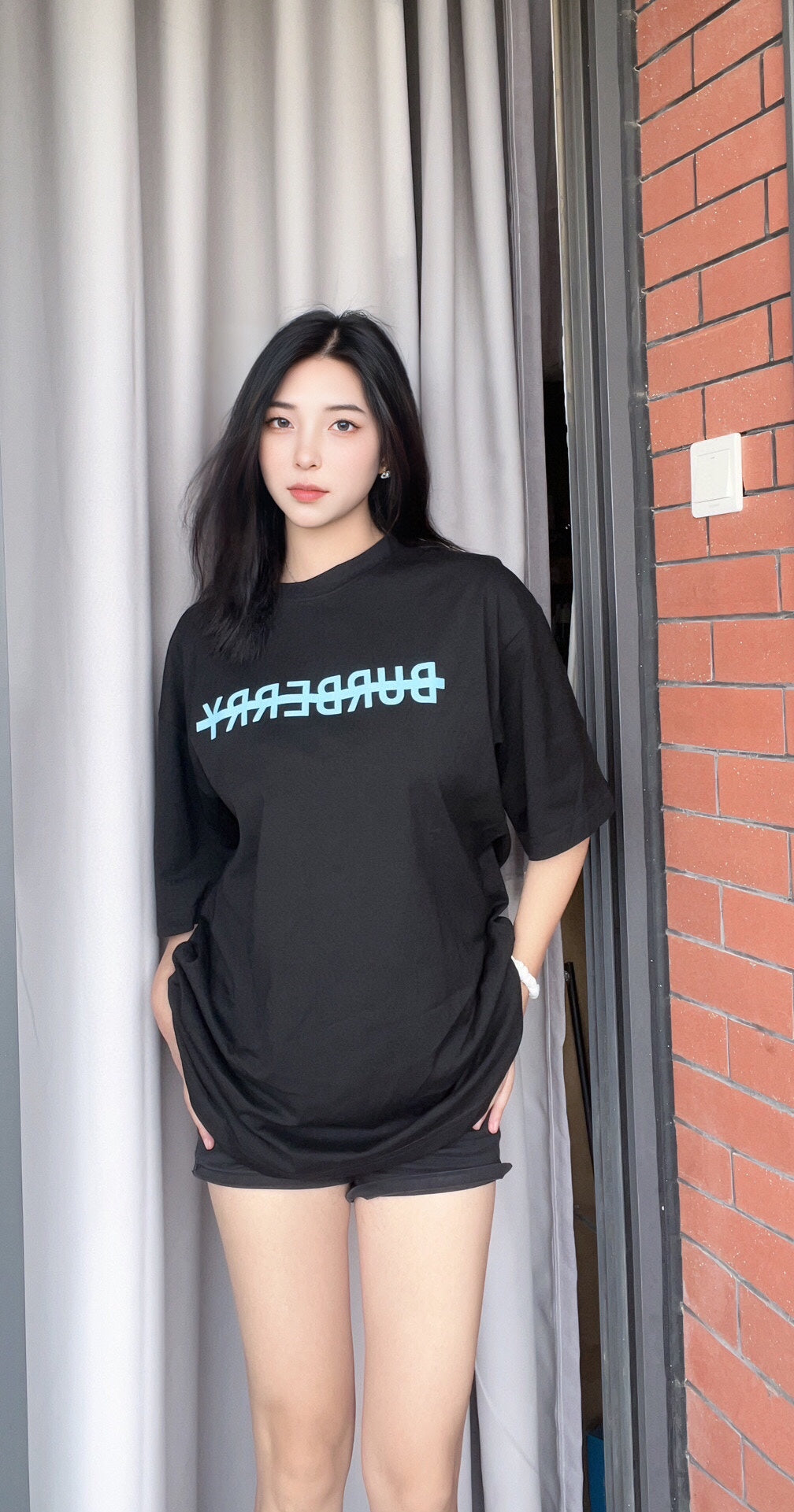 B**rry t-shirt with strikethrough logo