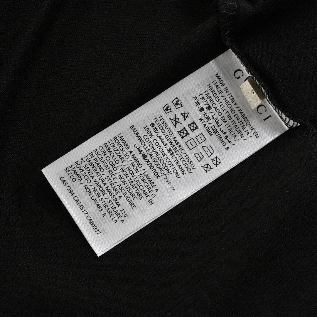 G*u*i black t-shirt with dragon cartoon