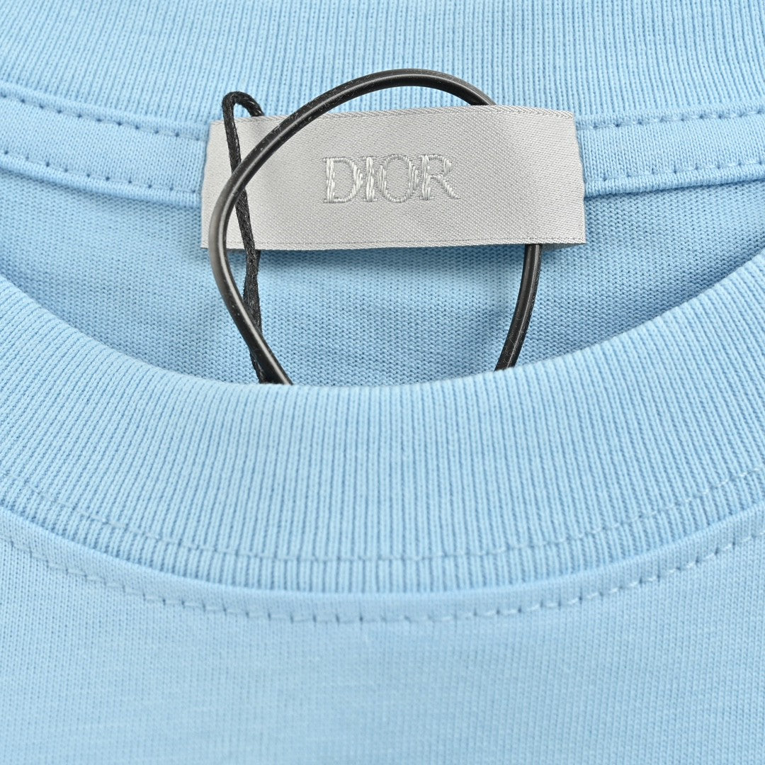D*or ch**an D*or couture light blue t-shirt