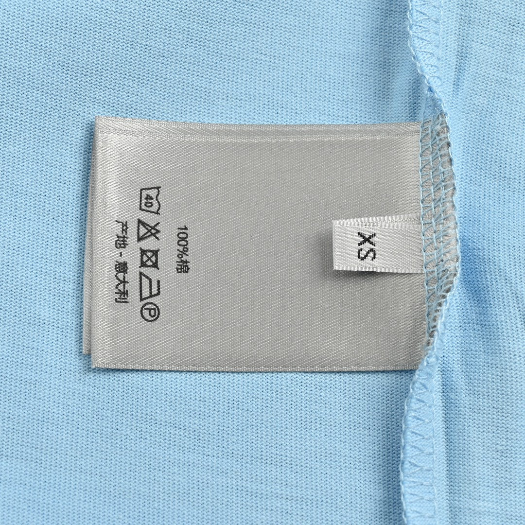 D*or ch**an D*or couture light blue t-shirt