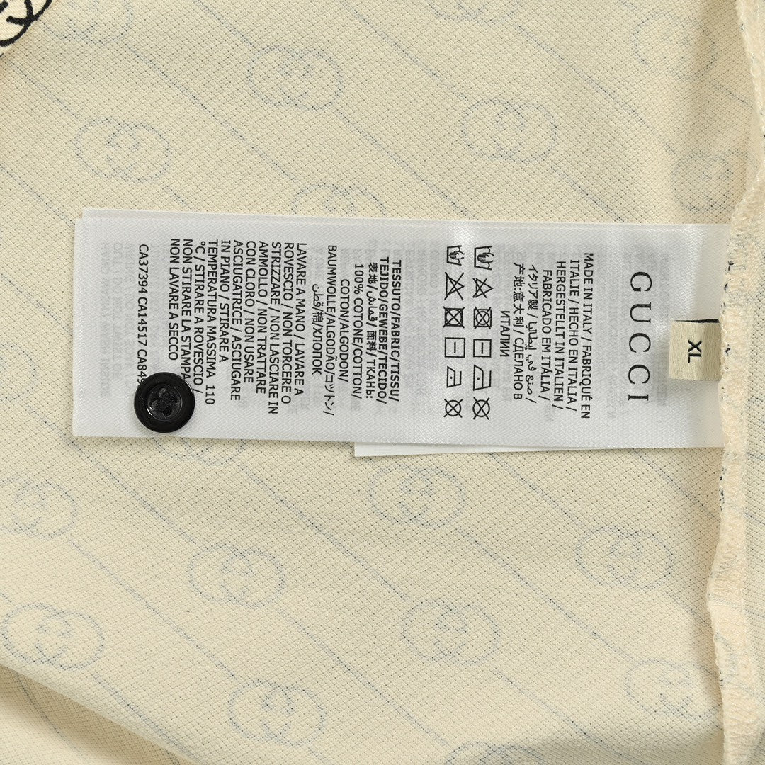 G*u*i beige and black patterned polo shirt
