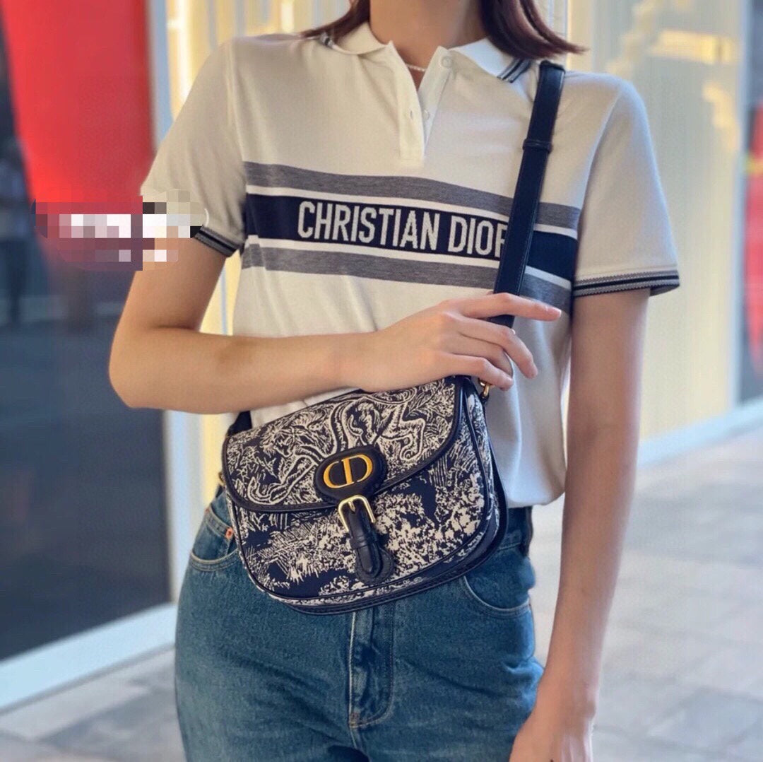 ch**an D*or "striped logo" polo shirt